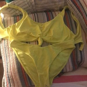 Small top medium bottom yellow bathing suit